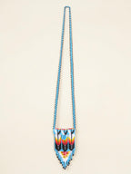 Beaded necklace with a colorful pattern on a beige background