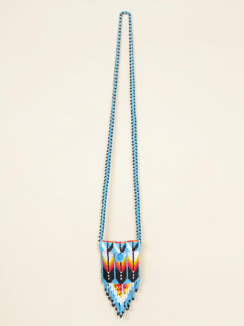 Beaded necklace with a colorful pattern on a beige background